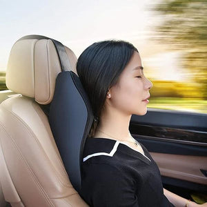 Woman using a car neck pillow in a vehicle