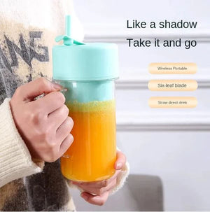 Hand holding a blue and orange tumbler with text about features.