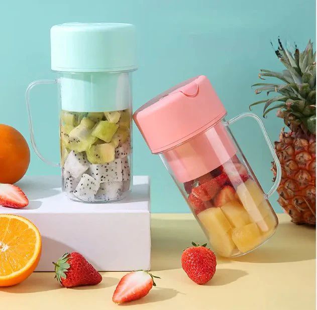 Two portable fruit infusers with fruits inside on a colorful background