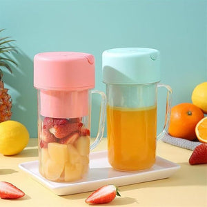 Two portable fruit infusers with pink and blue lids on a tray with fruits around.
