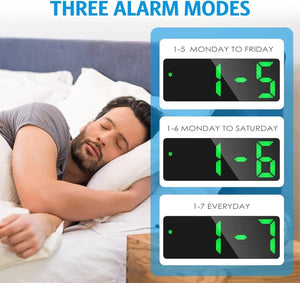 Person sleeping with an alarm clock displaying different modes on a screen.